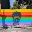 The mural "Standing with Dunja Hayali" by LAPIZ showed up on a construction site's fence on Hamburg's Reeperbahn